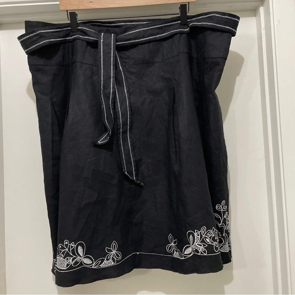 Lane Bryant new with tags skirt. Size 24. Black with white embroidered accents.